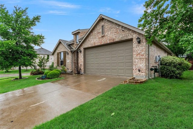 view of front facade featuring an attached garage, concrete driveway, a front lawn, and brick siding