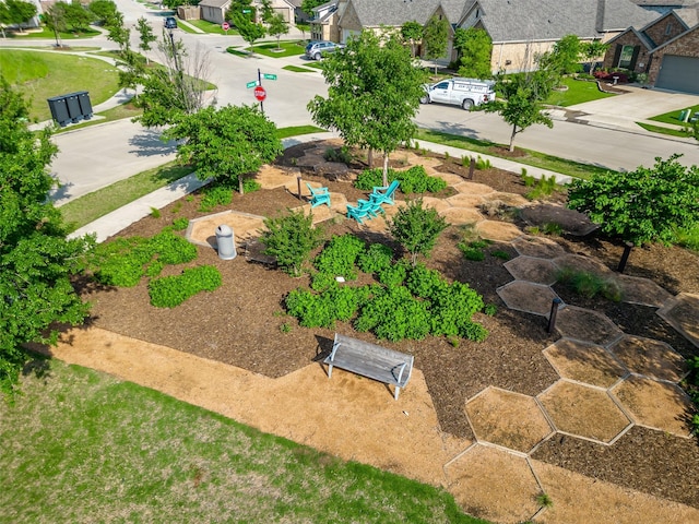 birds eye view of property with a residential view
