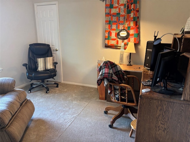 home office featuring carpet floors and baseboards