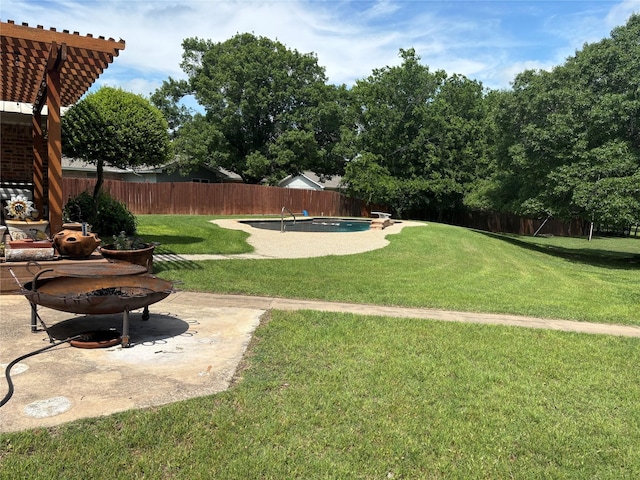 view of yard featuring a fenced backyard, a fenced in pool, a pergola, and a patio