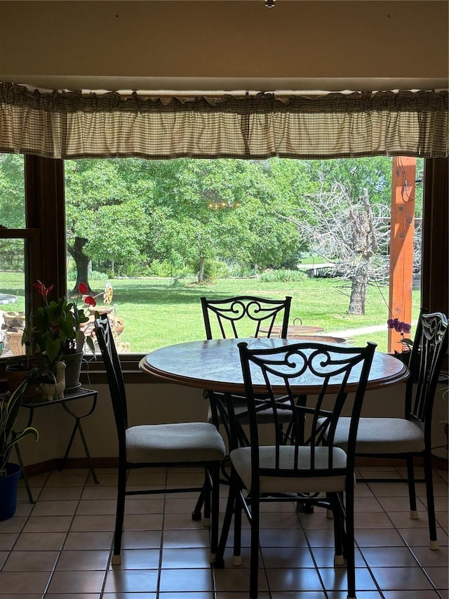 dining area with tile patterned floors