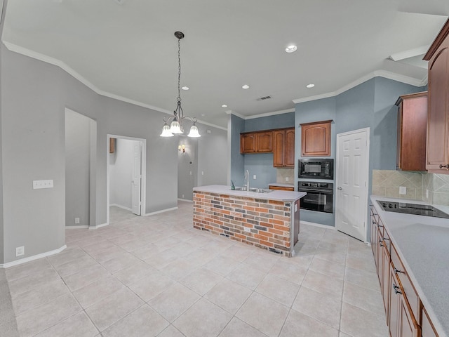 kitchen with crown molding, a sink, light tile patterned floors, and black appliances