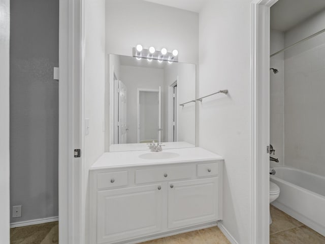 full bathroom featuring vanity, baseboards, bathtub / shower combination, and toilet