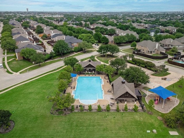 birds eye view of property with a residential view