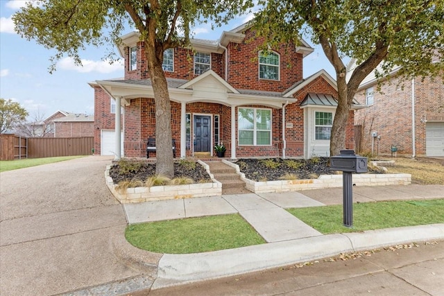 4460 Connemara Dr, Frisco, TX 75034 - traditional-style home featuring brick siding, a garage, fence, and driveway