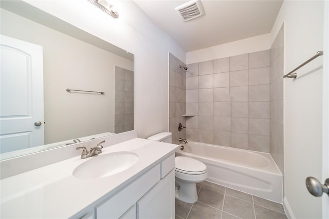 341 Gleneagles Dr, Garland, TX 75040 - bathroom featuring tile patterned flooring, visible vents, vanity, toilet, and shower / tub combination