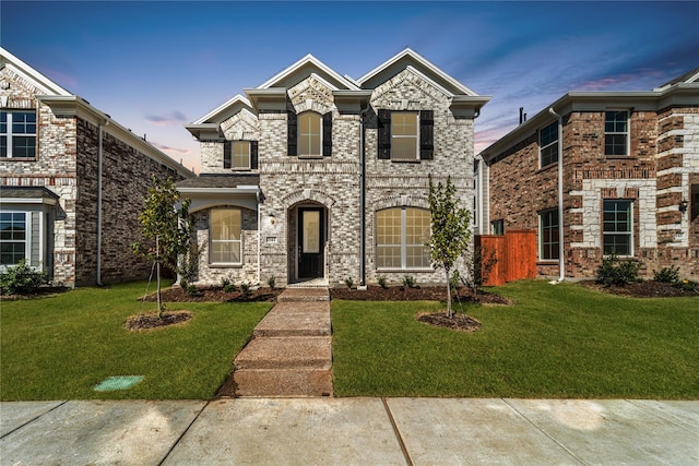 341 Gleneagles Dr, Garland, TX 75040 - french country inspired facade featuring a front lawn