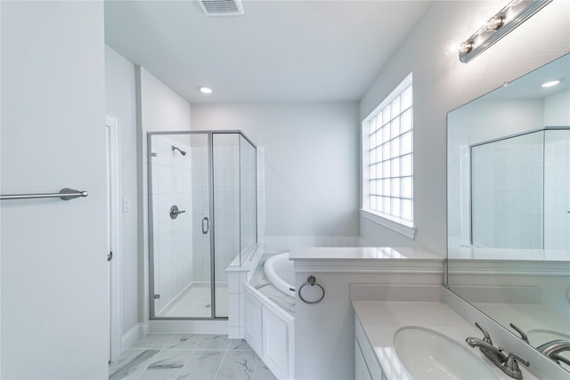 341 Gleneagles Dr, Garland, TX 75040 - full bath with marble finish floor, recessed lighting, a shower stall, visible vents, and a garden tub
