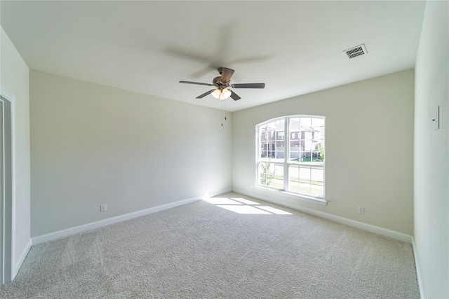 341 Gleneagles Dr, Garland, TX 75040 - spare room featuring visible vents, a ceiling fan, baseboards, and carpet floors