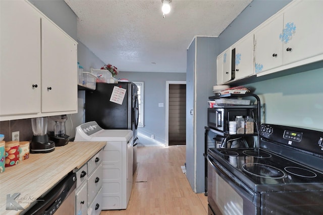 934 Burger St, Abilene, TX 79603 - kitchen with washing machine and clothes dryer, white cabinets, black appliances, and light wood-type flooring