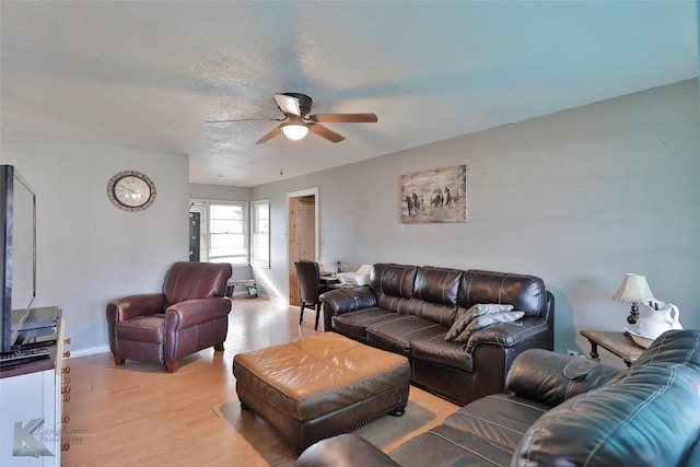 934 Burger St, Abilene, TX 79603 - living area with baseboards, a ceiling fan, and light wood-style flooring