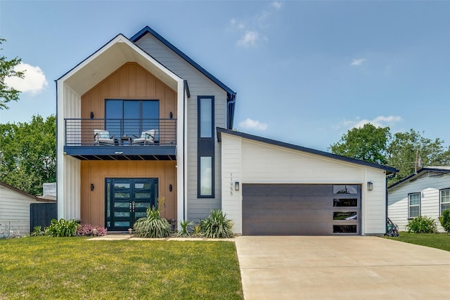 11955 Hoblitzelle Dr, Dallas, TX 75243 - contemporary home with board and batten siding, a balcony, a lawn, concrete driveway, and an attached garage