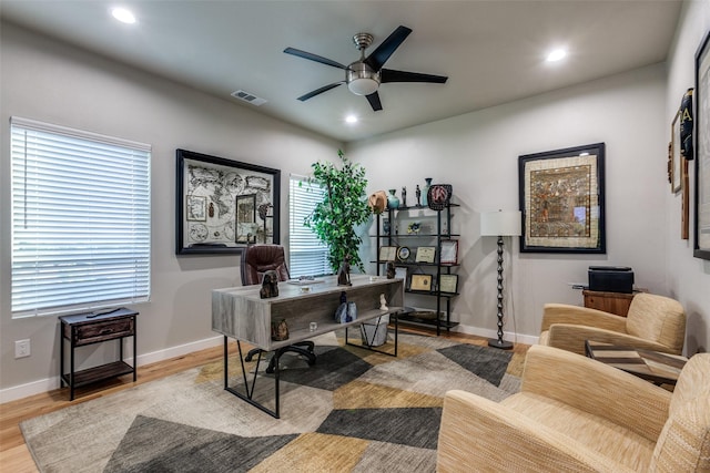 11955 Hoblitzelle Dr, Dallas, TX 75243 - living area with wood finished floors, a ceiling fan, and recessed lighting