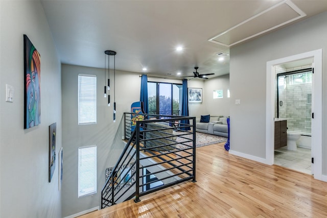 11955 Hoblitzelle Dr, Dallas, TX 75243 - stairs featuring attic access, wood finished floors, baseboards, recessed lighting, and ceiling fan