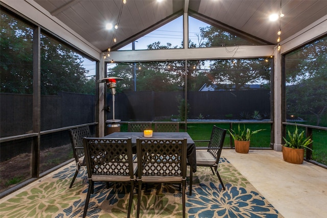 11955 Hoblitzelle Dr, Dallas, TX 75243 - sunroom / solarium featuring outdoor dining space and vaulted ceiling