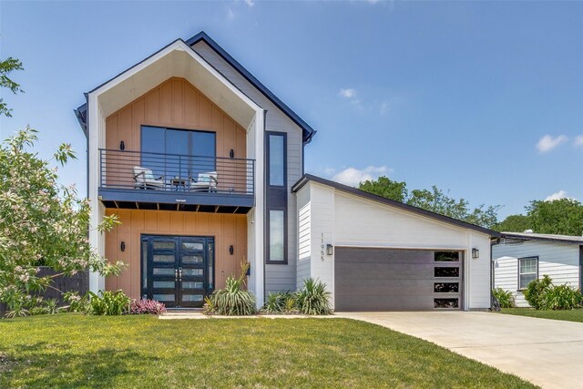 11955 Hoblitzelle Dr, Dallas, TX 75243 - modern home featuring a balcony, french doors, an attached garage, and board and batten siding