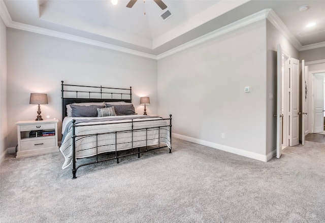 carpeted bedroom featuring visible vents, baseboards, a raised ceiling, ornamental molding, and recessed lighting