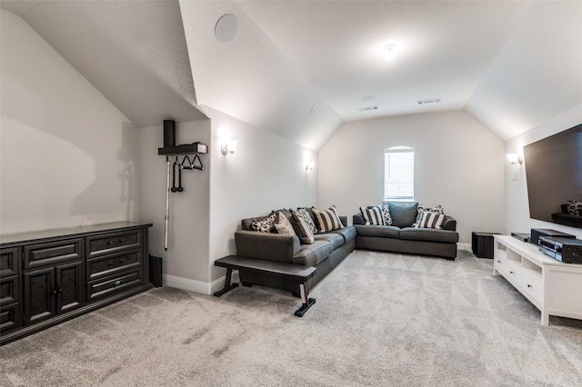 living area with baseboards, visible vents, light carpet, and lofted ceiling