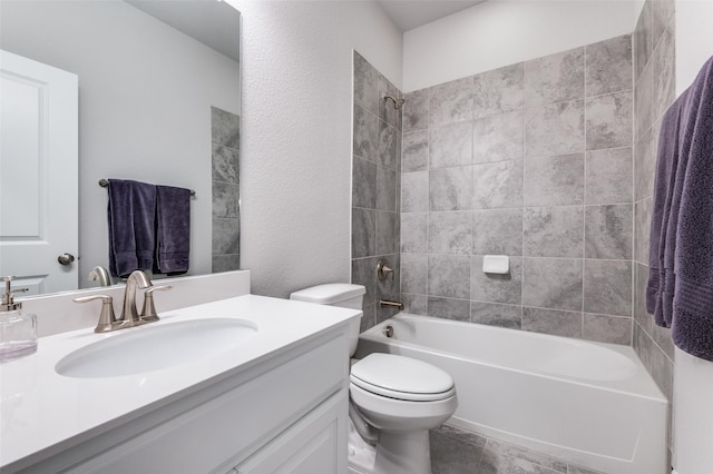 full bath featuring shower / bathtub combination, tile patterned floors, vanity, and toilet