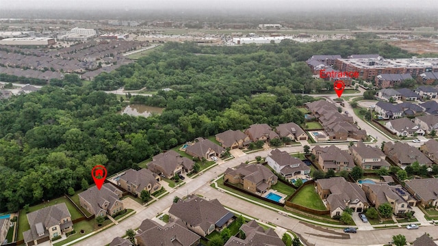 birds eye view of property with a residential view