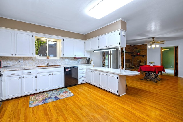 1730 W Hull St, Denison, TX 75020 - kitchen with black dishwasher, white cabinets, decorative backsplash, and light wood-style floors