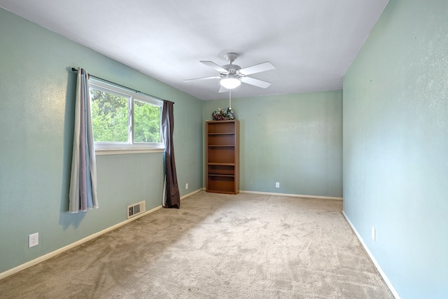 1730 W Hull St, Denison, TX 75020 - unfurnished room with carpet floors, ceiling fan, baseboards, and visible vents