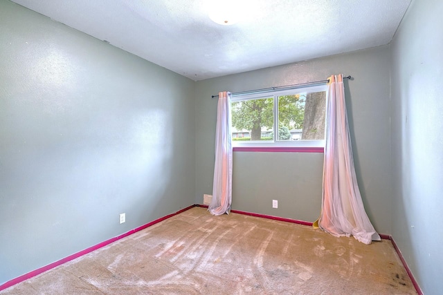 1730 W Hull St, Denison, TX 75020 - carpeted spare room featuring baseboards