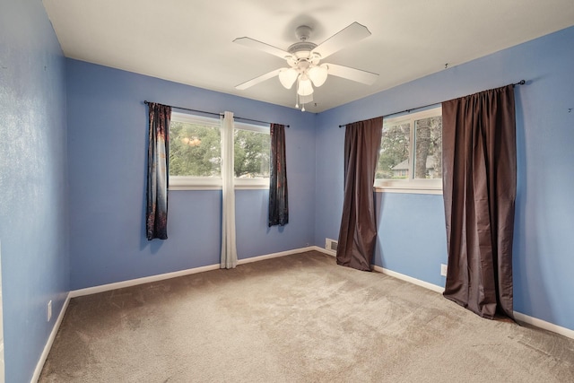 1730 W Hull St, Denison, TX 75020 - empty room with baseboards, a ceiling fan, carpet flooring, and visible vents