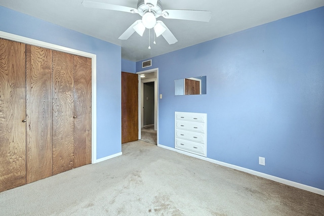 1730 W Hull St, Denison, TX 75020 - unfurnished bedroom with visible vents, a ceiling fan, a closet, baseboards, and carpet flooring
