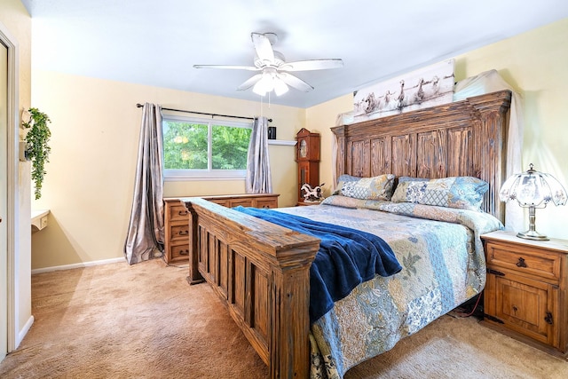 1730 W Hull St, Denison, TX 75020 - bedroom with baseboards, ceiling fan, and light carpet