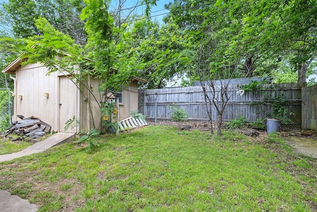 1730 W Hull St, Denison, TX 75020 - view of yard featuring a storage shed, an outbuilding, and a fenced backyard