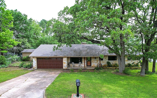1730 W Hull St, Denison, TX 75020 - single story home with covered porch, an attached garage, a front lawn, and stone siding