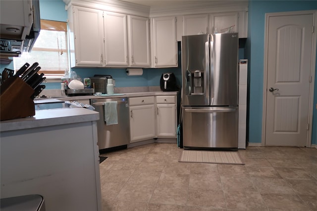 kitchen with light countertops, white cabinetry, and appliances with stainless steel finishes