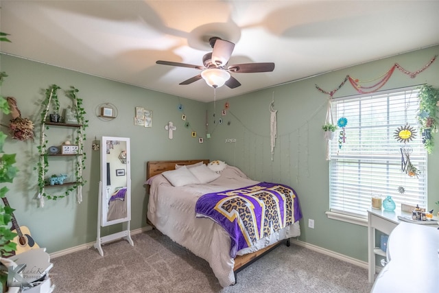 carpeted bedroom featuring a ceiling fan
