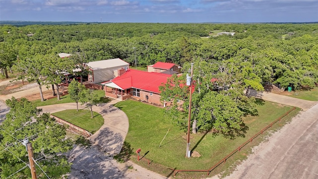 aerial view with a wooded view