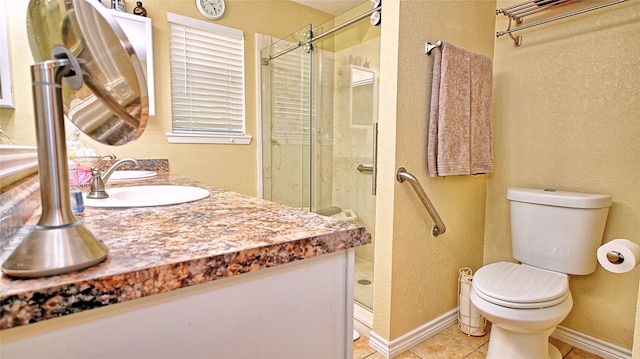 full bathroom featuring tile patterned flooring, a stall shower, toilet, and a textured wall