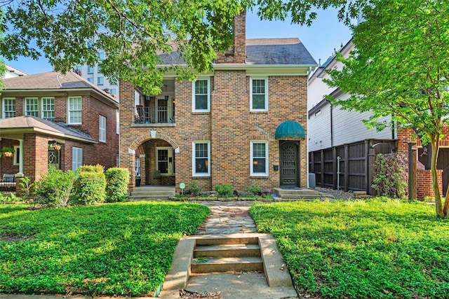4204 Prescott Ave, Dallas, TX 75219 - traditional-style home with brick siding, a shingled roof, fence, and a chimney