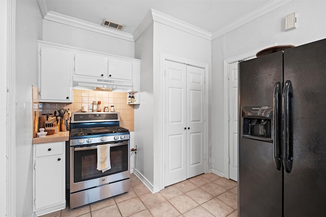 4204 Prescott Ave, Dallas, TX 75219 - kitchen featuring crown molding, stainless steel gas range oven, black refrigerator with ice dispenser, under cabinet range hood, and visible vents