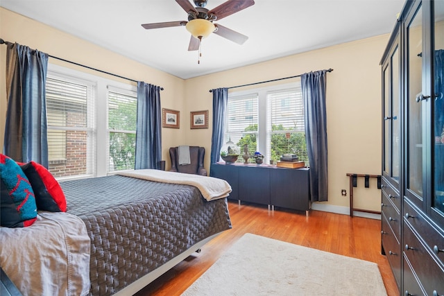 4204 Prescott Ave, Dallas, TX 75219 - bedroom featuring ceiling fan and wood finished floors