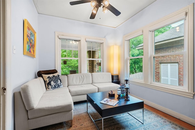 4204 Prescott Ave, Dallas, TX 75219 - living room with baseboards, a ceiling fan, and wood finished floors