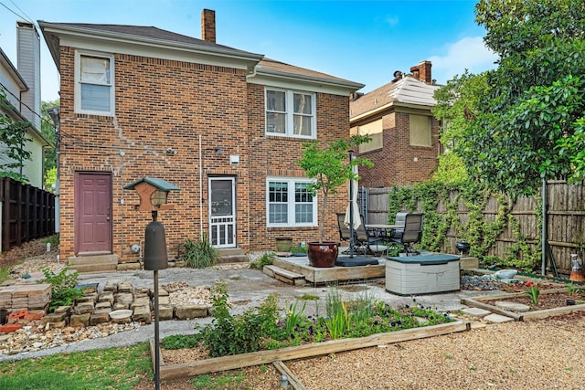 4204 Prescott Ave, Dallas, TX 75219 - back of house with a fenced backyard, a patio, a chimney, and brick siding