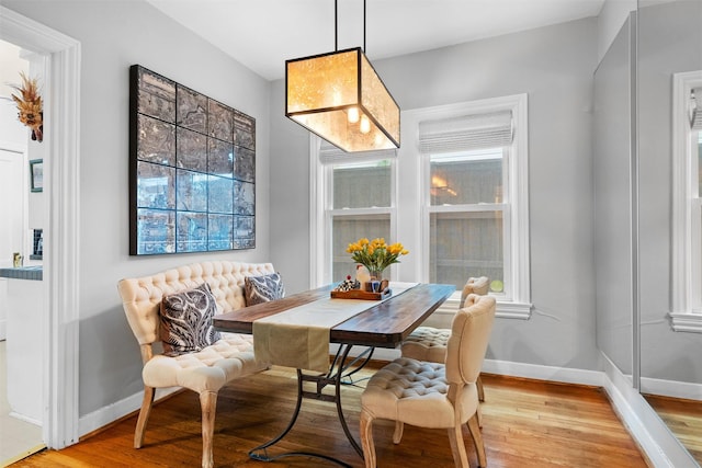 4204 Prescott Ave, Dallas, TX 75219 - dining room featuring light wood-style floors, baseboards, and breakfast area