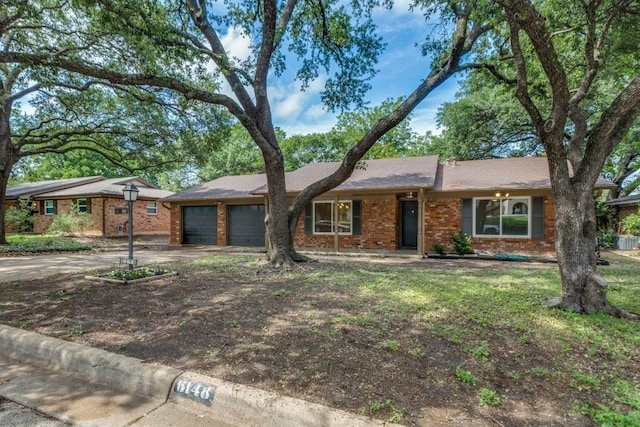 6148 Wrigley Way, Fort Worth, TX 76133 - ranch-style house featuring concrete driveway, brick siding, and an attached garage