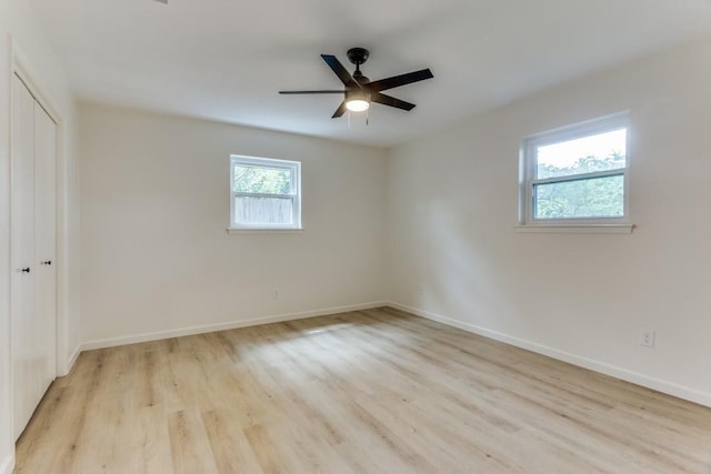 6148 Wrigley Way, Fort Worth, TX 76133 - unfurnished bedroom with light wood-style floors, baseboards, and a closet