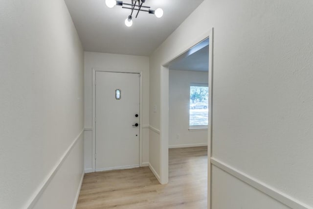6148 Wrigley Way, Fort Worth, TX 76133 - entryway featuring light wood-type flooring and an inviting chandelier