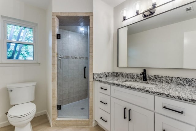6148 Wrigley Way, Fort Worth, TX 76133 - bathroom with toilet, visible vents, a shower stall, and vanity