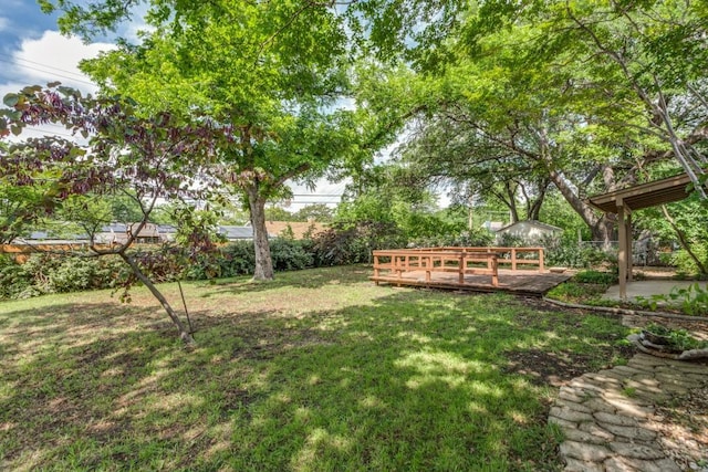 6148 Wrigley Way, Fort Worth, TX 76133 - view of yard with a deck and fence
