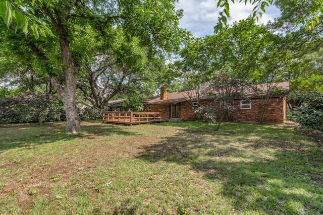 6148 Wrigley Way, Fort Worth, TX 76133 - view of yard featuring a wooden deck