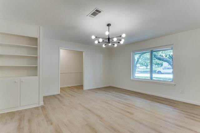 6148 Wrigley Way, Fort Worth, TX 76133 - unfurnished dining area featuring an inviting chandelier, baseboards, visible vents, and light wood-type flooring