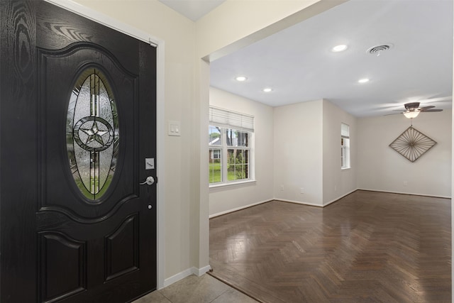 entryway featuring baseboards, a ceiling fan, visible vents, and recessed lighting